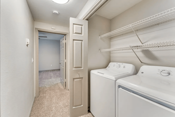 Full-size washer and dryer included in select units*
